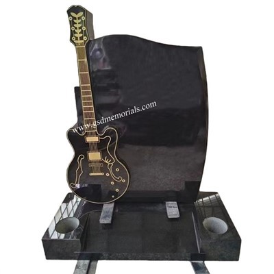 Izrezljani kitarski nagrobniki